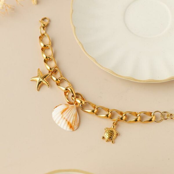 8dd30ed952494178805d27be05b48e55tplv-t5fjg24jzw-origin-jpeg.jpeg Bracelet HAWAÏEN couleur or