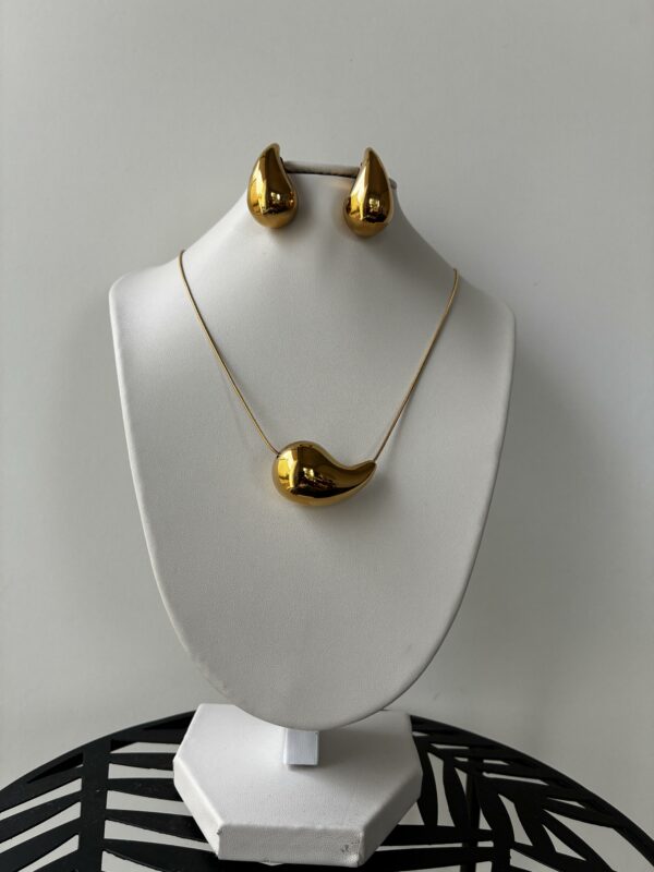 f58f0747ba504d02adeebd82111adaadtplv-t5fjg24jzw-origin-jpeg-8.jpeg Parure GOUTTE acier inoxyde couleur or