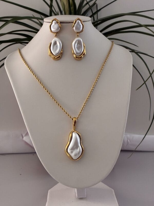 1f62d4c6b28c4a15bee672b9212beb02tplv-t5fjg24jzw-origin-jpeg-2.jpeg Parure ENORA en Acier Inoxydable 316 plaqué Or