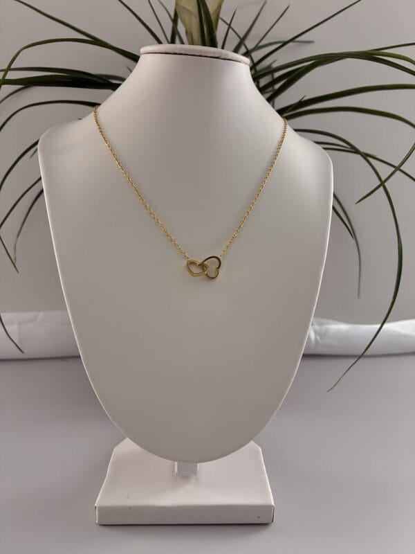 5395fce6d9f1410c993760a92f084772tplv-t5fjg24jzw-origin-jpeg.jpeg Collier DUO DE ŒUR en Acier Inoxydable 316 plaqué Or