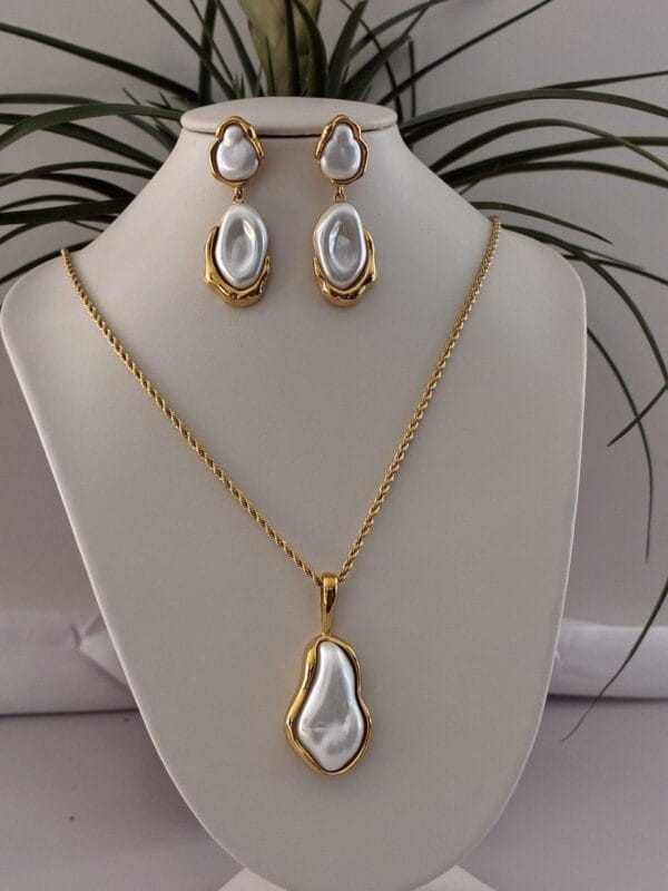 6901b0e77e824f5594d0369bd12ae8bdtplv-t5fjg24jzw-origin-jpeg-1.jpeg Parure ENORA en Acier Inoxydable 316 plaqué Or