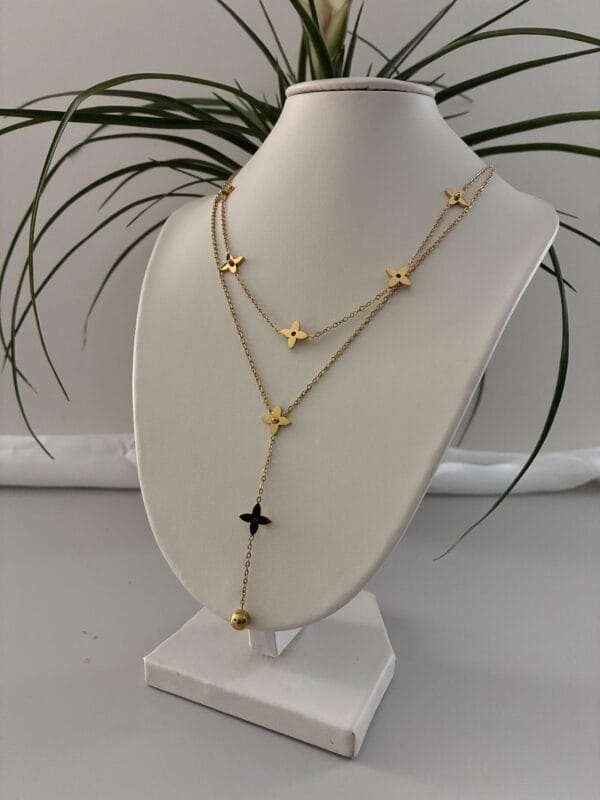 8960d982c528451985d12a6e99f66e1ctplv-t5fjg24jzw-origin-jpeg.jpeg Collier STAR OR en acier inoxydable 316 plaqué Or