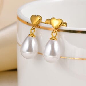 ef01576ba893440f81d446b47fdffec6tplv-t5fjg24jzw-origin-jpeg-1.jpeg Boucles d'oreilles PAOLA en Acier inoxydable perle blanche